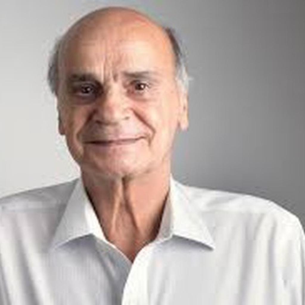 Drauzio Varella, careca, branco, sorri